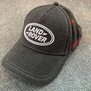 Land Rover branded new Adjustable “One Size” baseball cap. Gray w/ Orange accent